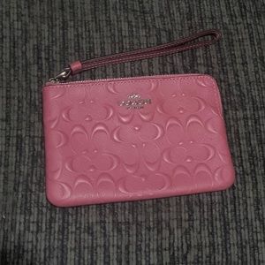 Dusky pink Coach pouch wristlet